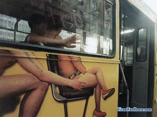 Bodies painted on the side of a bus